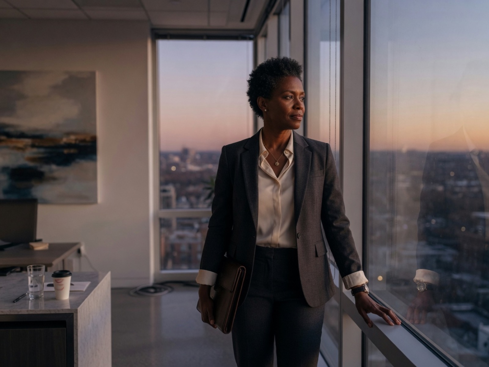 Finance lead by a window at the end of the day